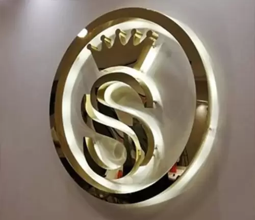 Solid Mirror Brass Letters with Warm LED Halo Glow